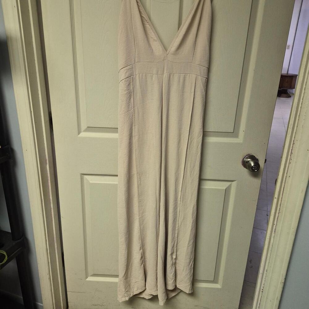 Cream jumpsuit with tie back